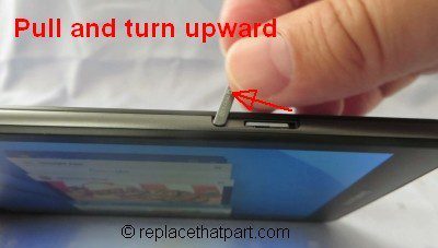 Push the microSD card into the socket with your fingernail 